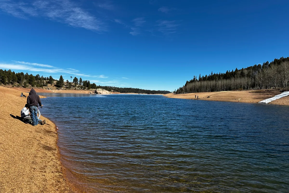 Winter fishing on the shore of Rampart Reservoir